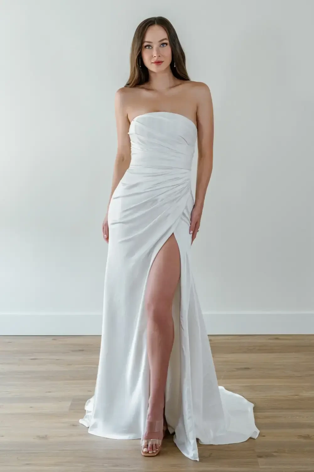 model is wearing a strapless bridal gown