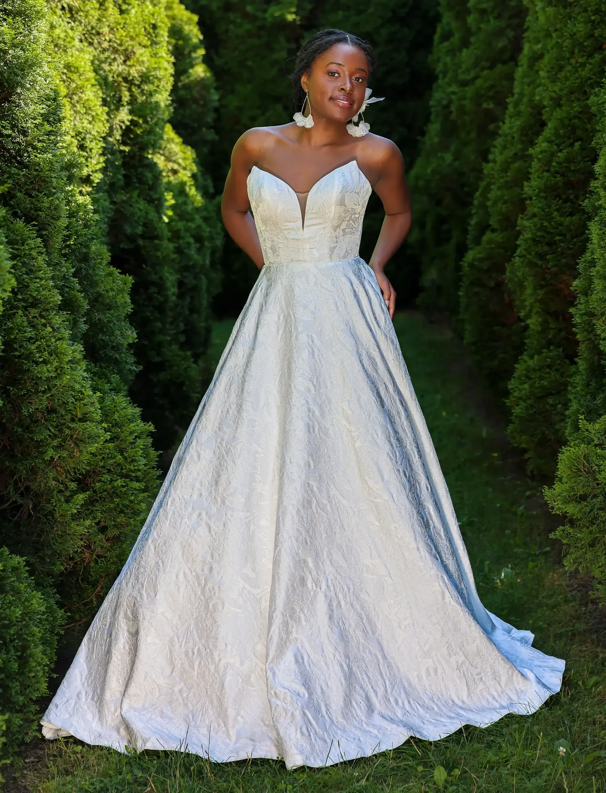 Model wearing a white gown