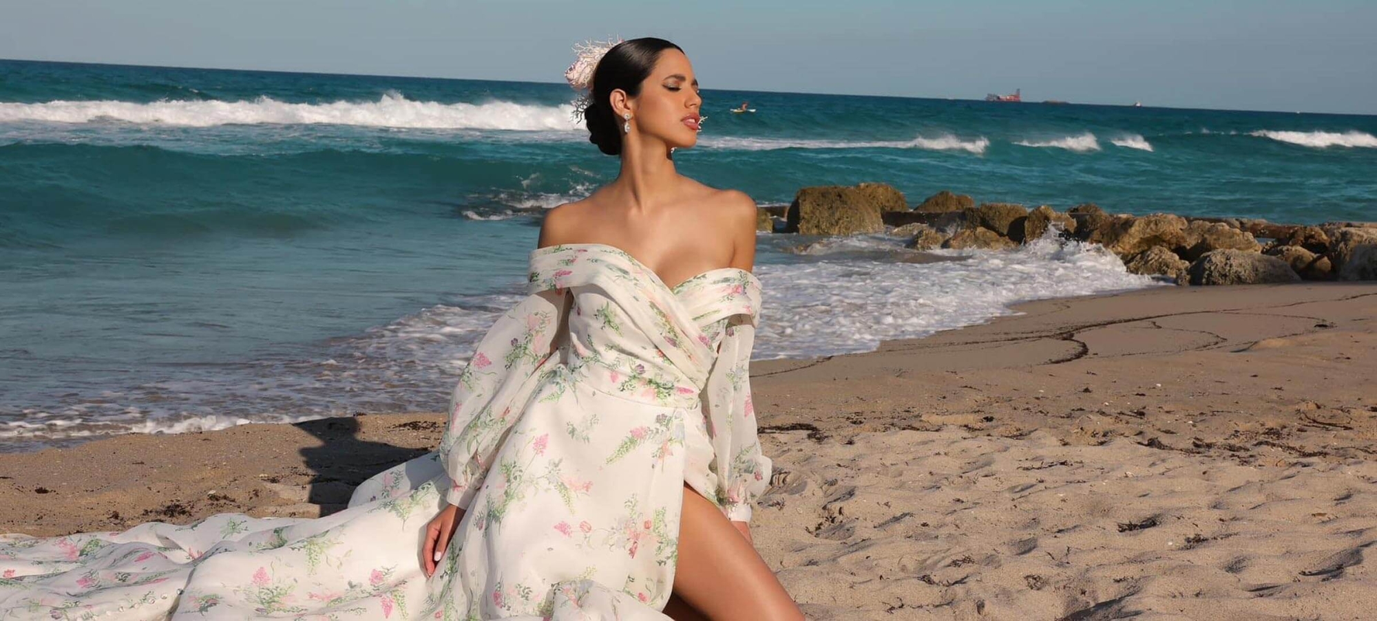 Model wearing a dress on the beach